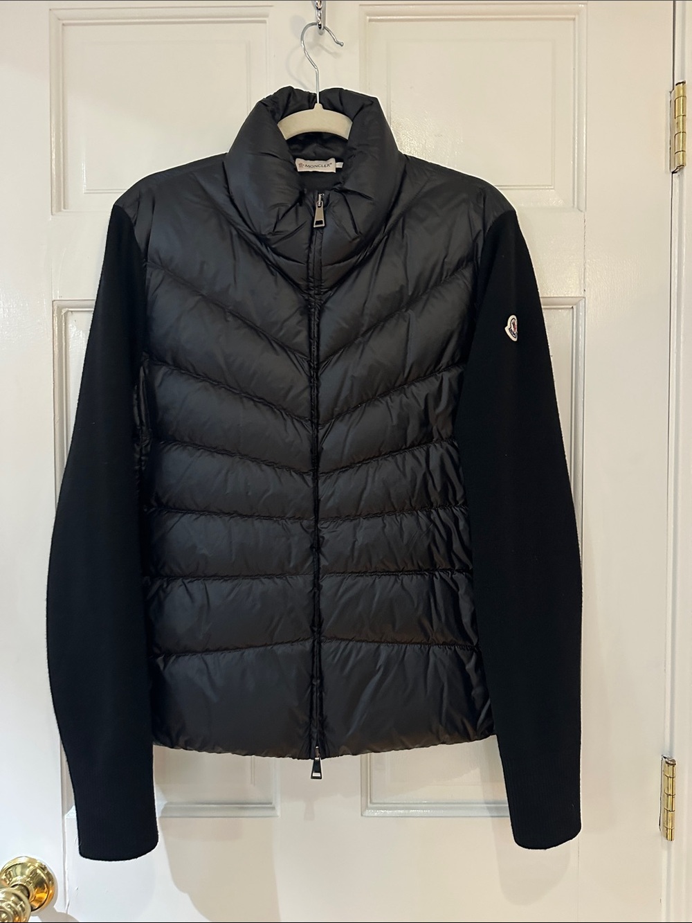 Moncler Black Quilted Down Jacket with Knit Sleeves and High Collar